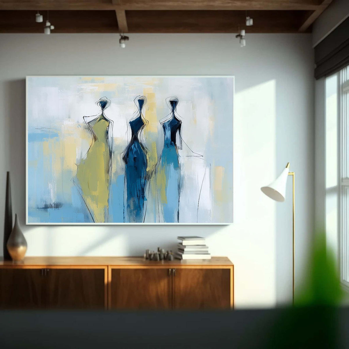 Three Stylized Figures In Blue And Yellow Gowns